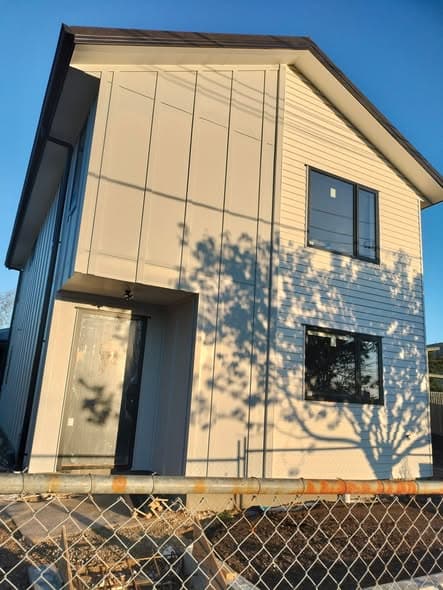 Freshly repainted two-storey home exterior in Rotorua