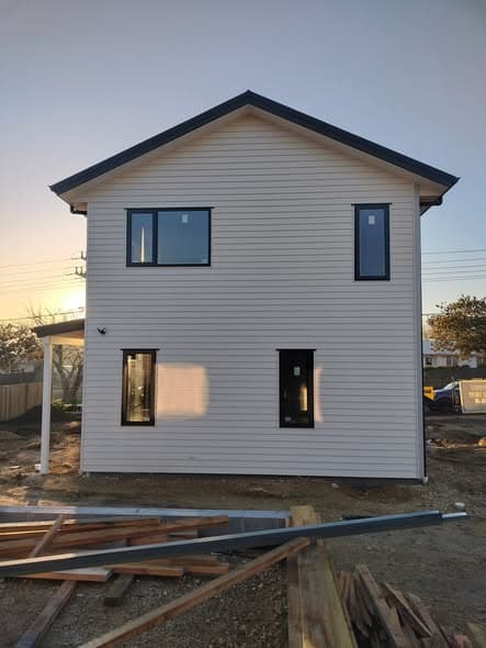 New-build exterior painting and cladding