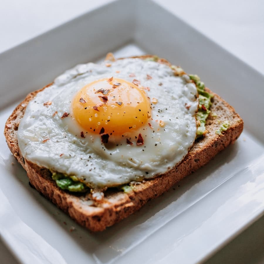 Breakfast sandwich with egg and greens
